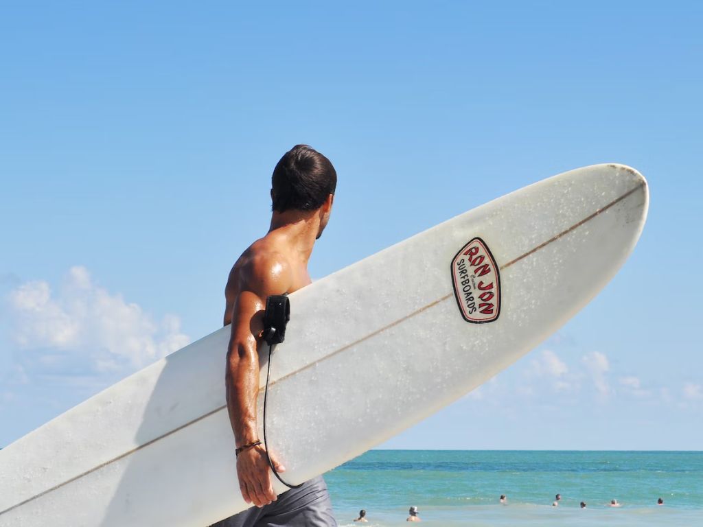 What does surfing do to your body?